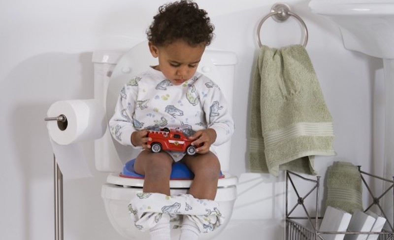 potty training boy sitting on potty toilet